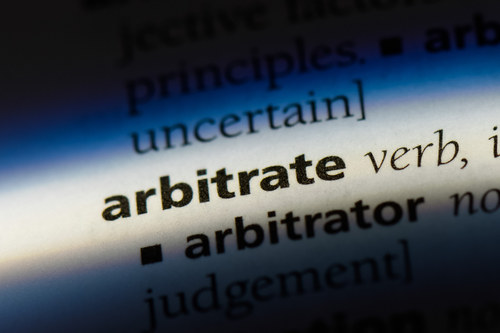 THE ARBITRATION PROVISION SHOULD DICTATE WHETHER JUDGE OR ARBITRATOR ...